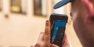 a man using his phone camera