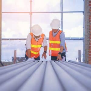 2 Men Working on Construction Plans