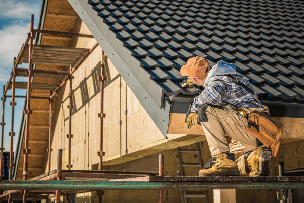 a worker building the attic